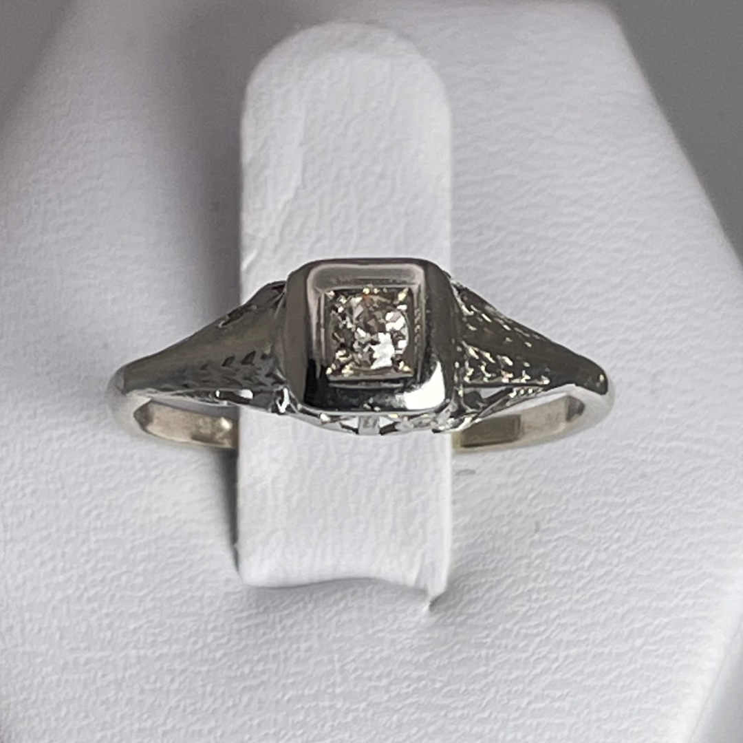 10k White Gold Round Cut 0.08ct Diamond Solitaire Ring