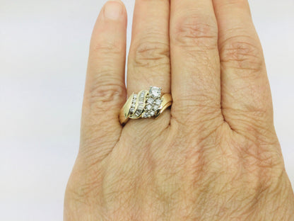 14k Yellow Gold Round and Baguette Cut 0.70ct Diamond Cluster Ring