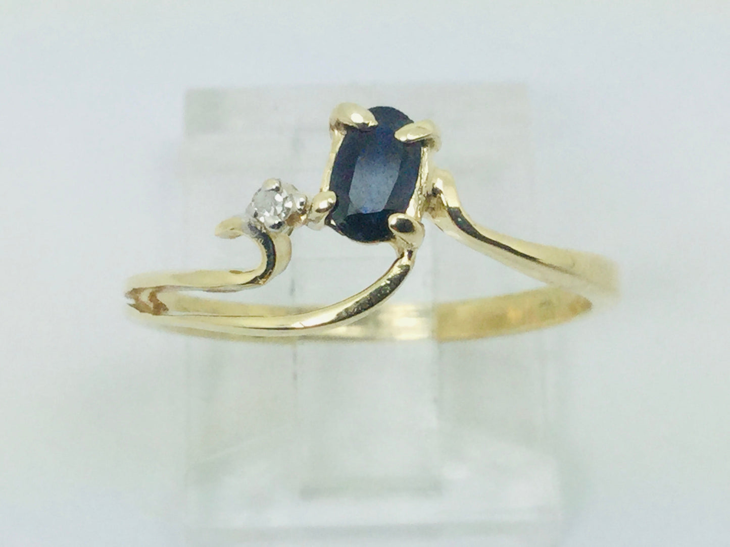 10k Yellow Gold Oval Cut 25pt Sapphire September Birthstone & 2pt Diamond Wave Ring