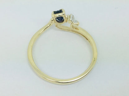 10k Yellow Gold Oval Cut 25pt Sapphire September Birthstone & 2pt Diamond Wave Ring