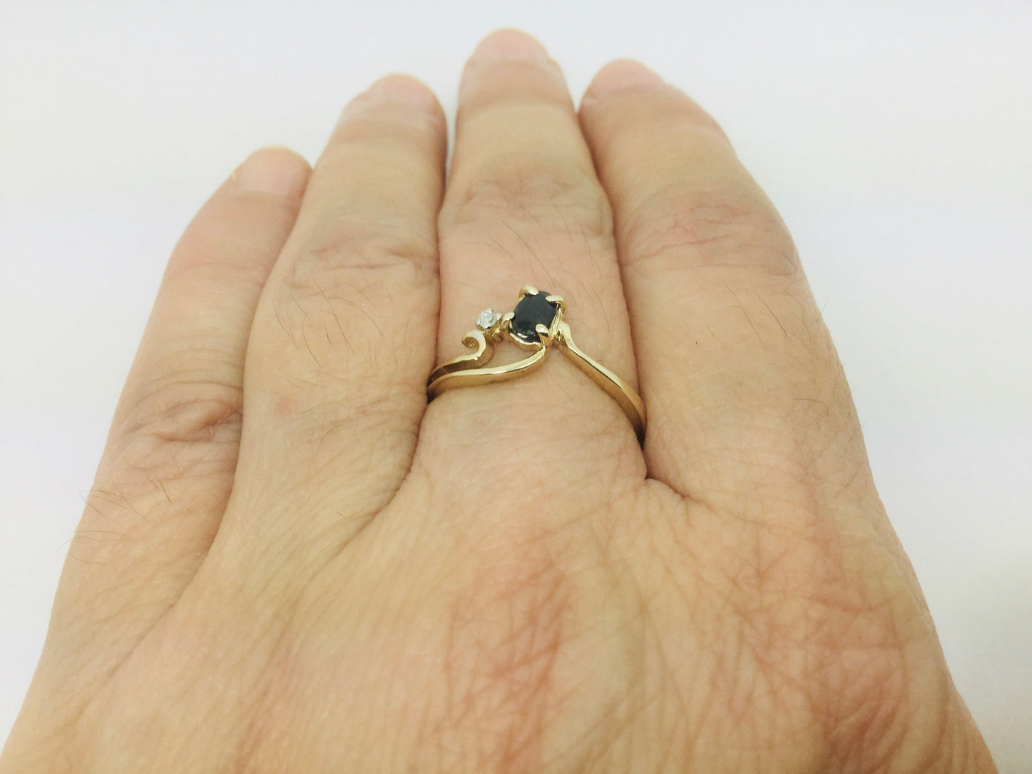 10k Yellow Gold Oval Cut 25pt Sapphire September Birthstone & 2pt Diamond Wave Ring