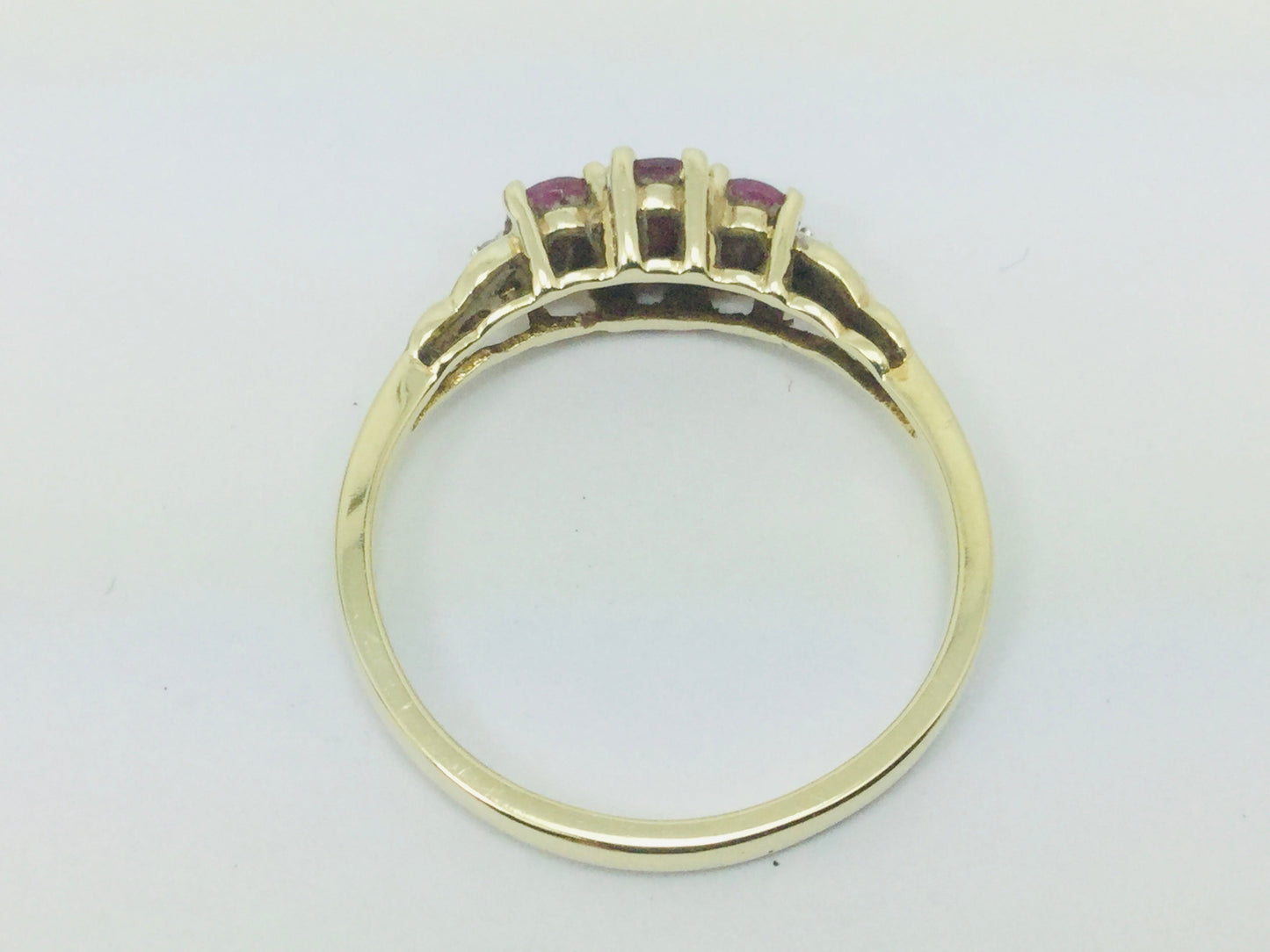 10k Yellow Gold Oval Cut Ruby July Birthstone Trinity & Diamond Ring