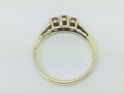 10k Yellow Gold Oval Cut Ruby July Birthstone Trinity & Diamond Ring