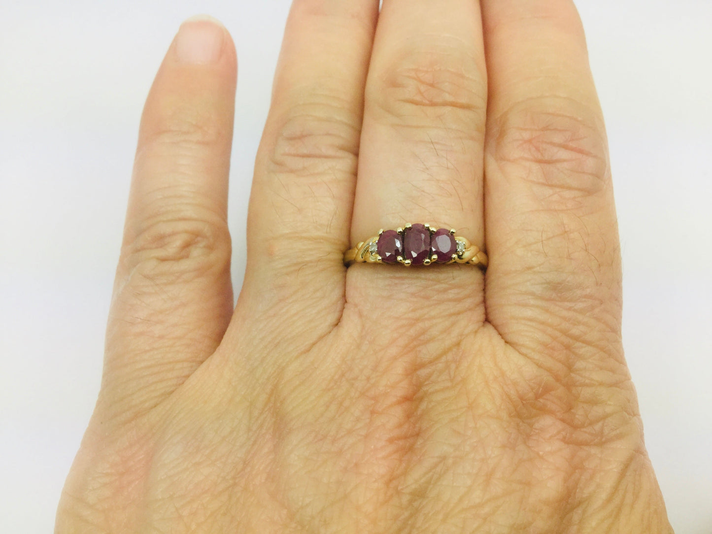10k Yellow Gold Oval Cut Ruby July Birthstone Trinity & Diamond Ring
