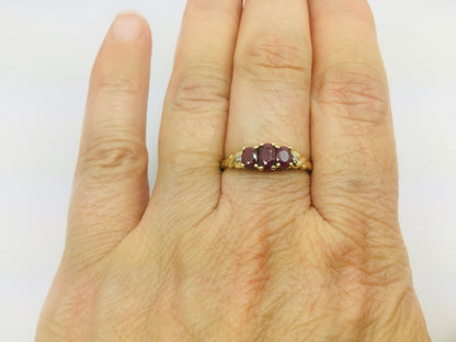 10k Yellow Gold Oval Cut Ruby July Birthstone Trinity & Diamond Ring