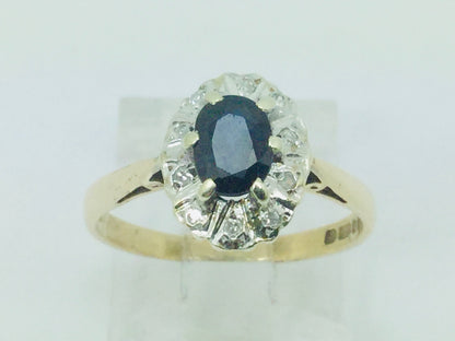 9k Yellow Gold Oval Cut 0.5ct Sapphire September Birthstone & 5pt Diamond Halo Ring
