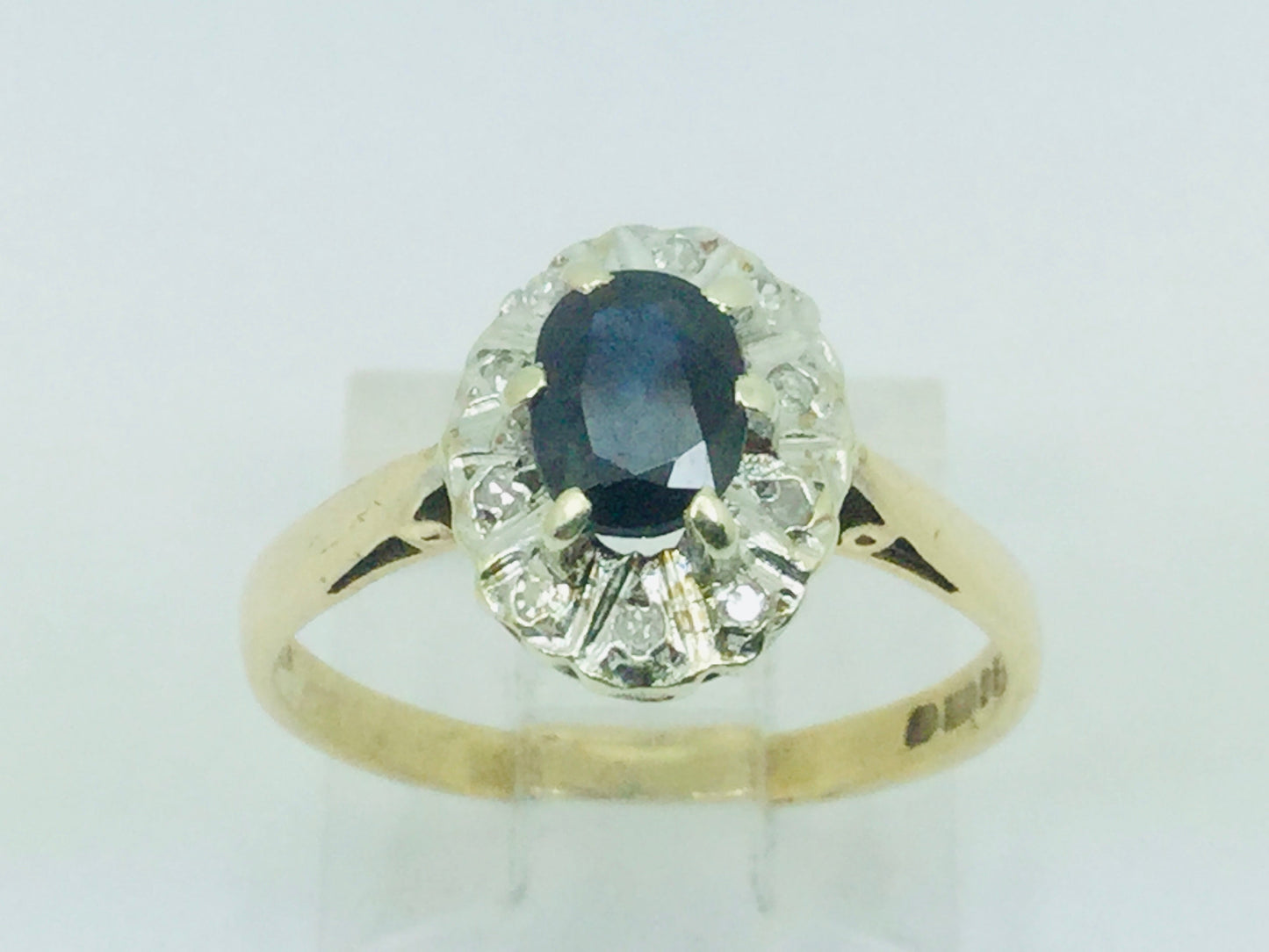 9k Yellow Gold Oval Cut 0.5ct Sapphire September Birthstone & 5pt Diamond Halo Ring