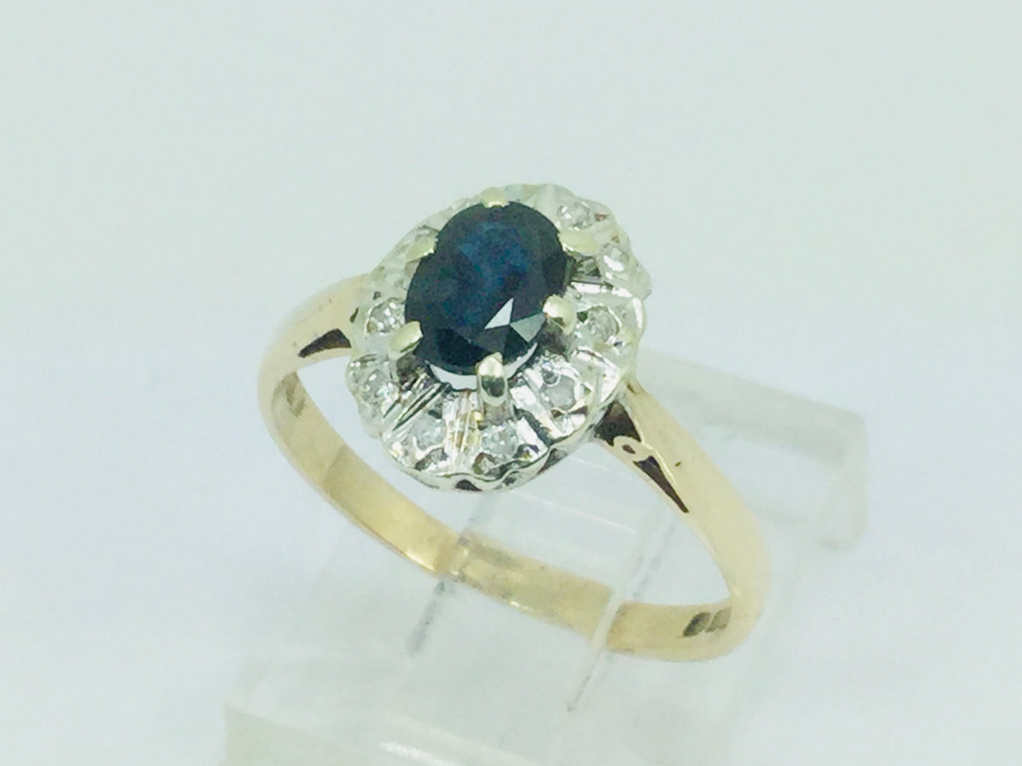 9k Yellow Gold Oval Cut 0.5ct Sapphire September Birthstone & 5pt Diamond Halo Ring