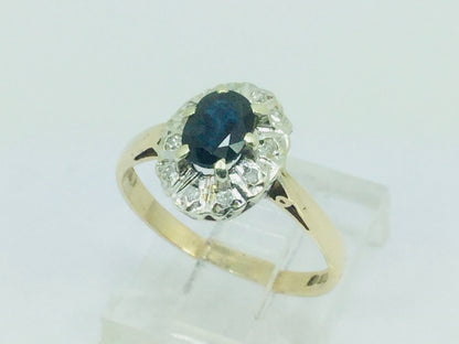 9k Yellow Gold Oval Cut 0.5ct Sapphire September Birthstone & 5pt Diamond Halo Ring