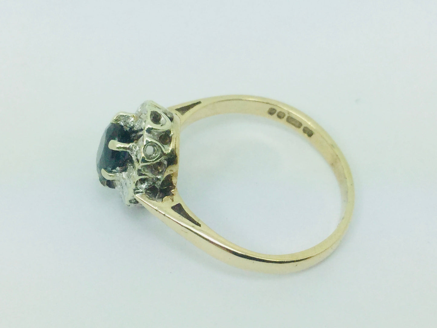 9k Yellow Gold Oval Cut 0.5ct Sapphire September Birthstone & 5pt Diamond Halo Ring