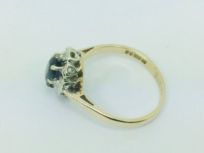 9k Yellow Gold Oval Cut 0.5ct Sapphire September Birthstone & 5pt Diamond Halo Ring