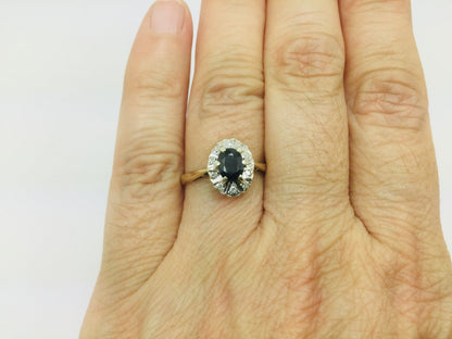 9k Yellow Gold Oval Cut 0.5ct Sapphire September Birthstone & 5pt Diamond Halo Ring