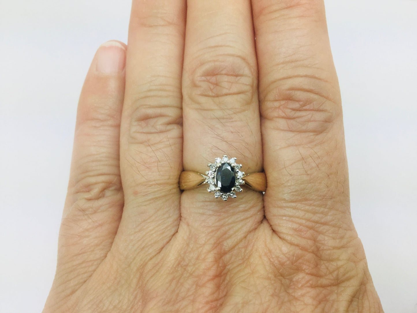 10k Yellow Gold Round Cut 50pt Sapphire & 7pt Diamond Ring