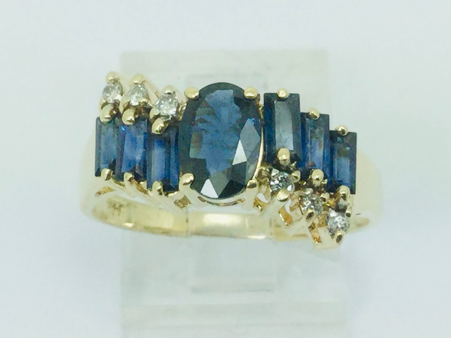 14k Yellow Gold Oval Cut and Baguette Cut 48pt Sapphire & 9pt Diamond Ring