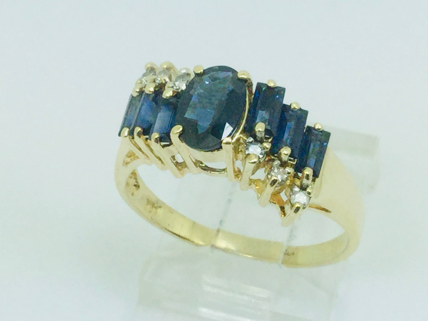14k Yellow Gold Oval Cut and Baguette Cut 48pt Sapphire & 9pt Diamond Ring