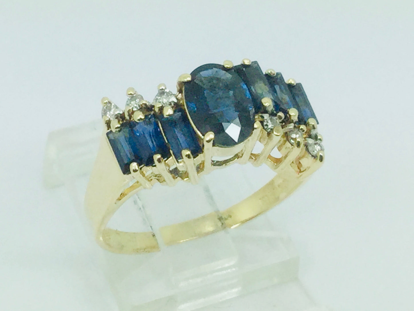 14k Yellow Gold Oval Cut and Baguette Cut 48pt Sapphire & 9pt Diamond Ring