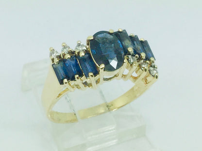 14k Yellow Gold Oval Cut and Baguette Cut 48pt Sapphire & 9pt Diamond Ring