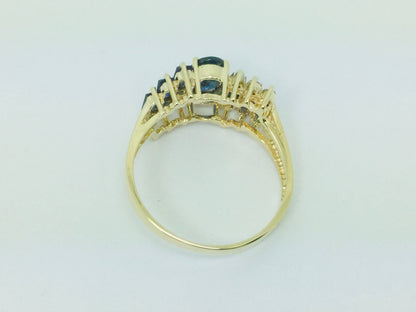 14k Yellow Gold Oval Cut and Baguette Cut 48pt Sapphire & 9pt Diamond Ring