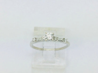 14k White Gold Round Cut 23pt Diamond with Round and Baguette Diamond Accents Ring