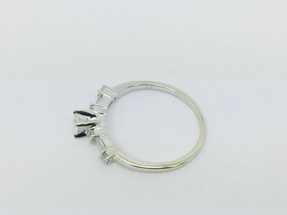 14k White Gold Round Cut 23pt Diamond with Round and Baguette Diamond Accents Ring