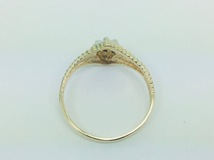 10k Yellow Gold Brilliant Cut 8pt Diamond Cluster Ring