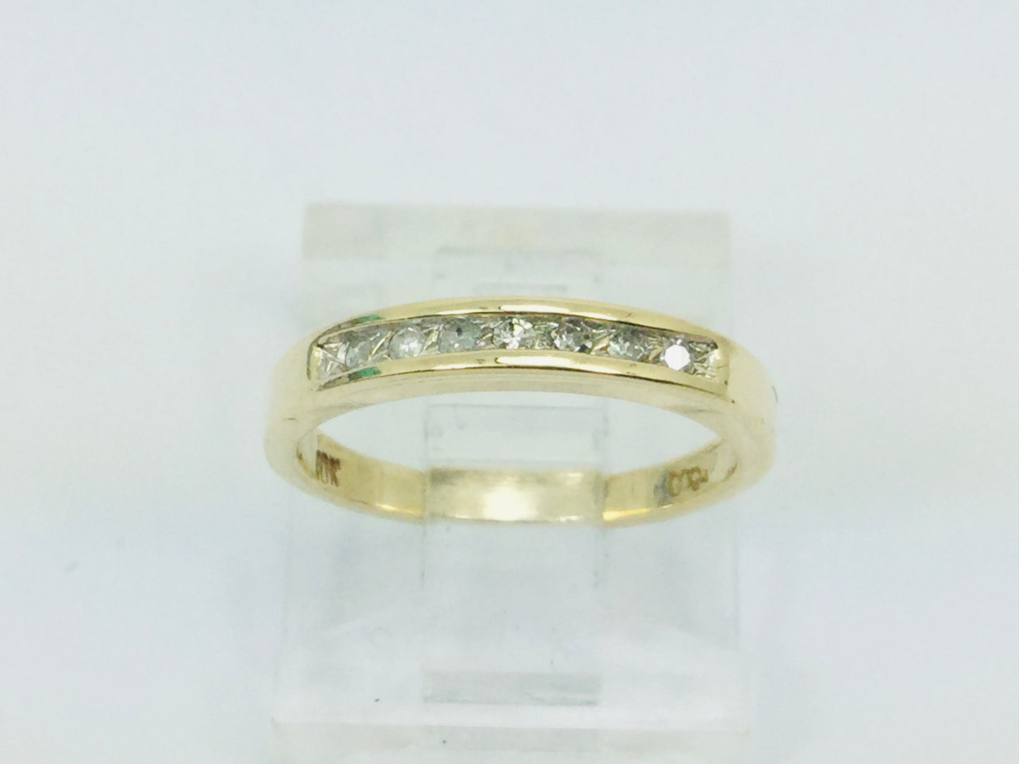 10k Yellow Gold Brilliant Cut 7pt Diamond Channel Set Ring