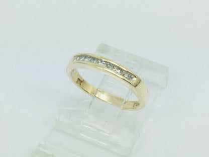 10k Yellow Gold Brilliant Cut 7pt Diamond Channel Set Ring