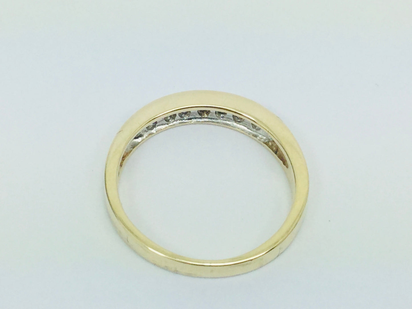 10k Yellow Gold Brilliant Cut 7pt Diamond Channel Set Ring