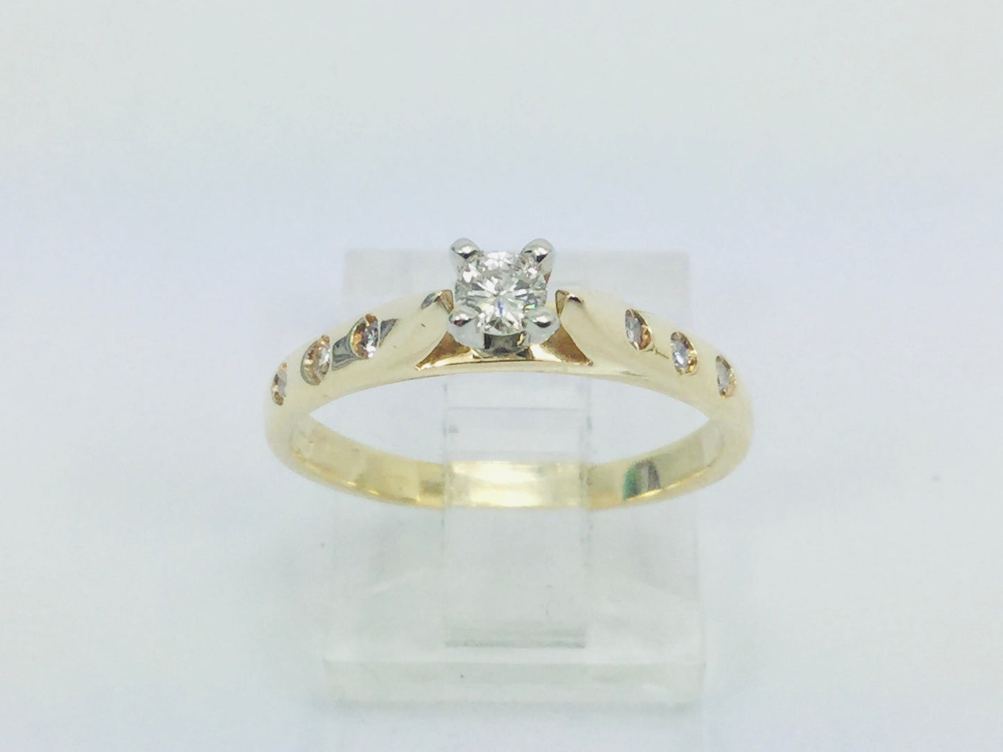14k Yellow Gold Round Cut 0.21ct Diamond Solitaire with Accents Ring