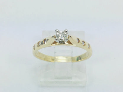 14k Yellow Gold Round Cut 0.21ct Diamond Solitaire with Accents Ring