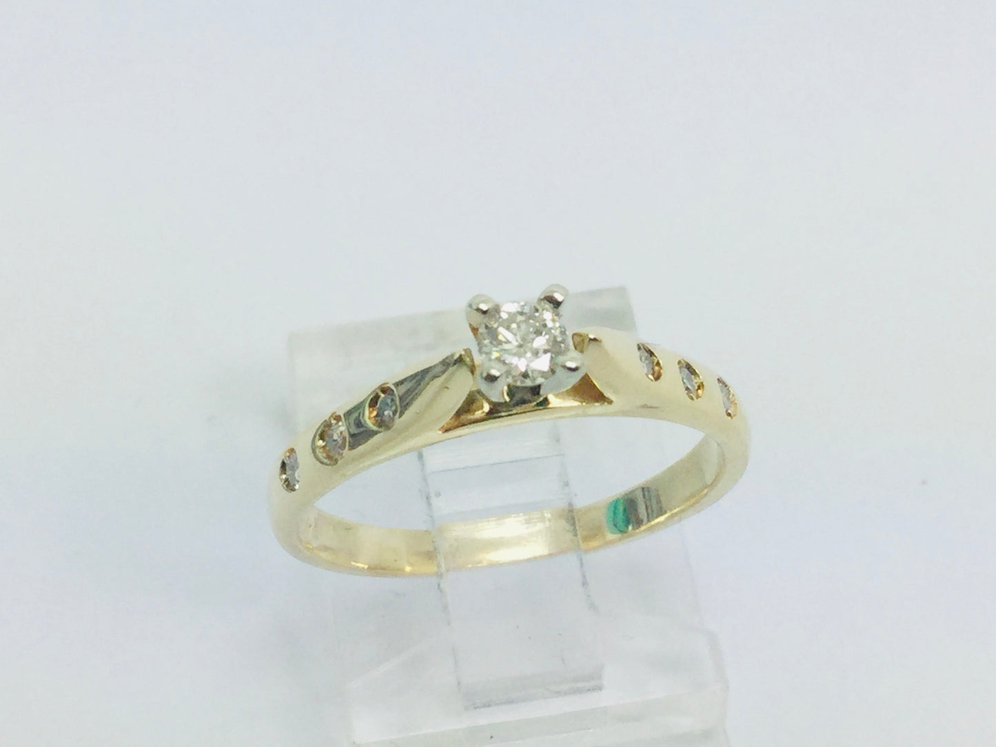 14k Yellow Gold Round Cut 0.21ct Diamond Solitaire with Accents Ring