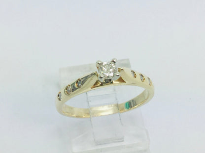 14k Yellow Gold Round Cut 0.21ct Diamond Solitaire with Accents Ring