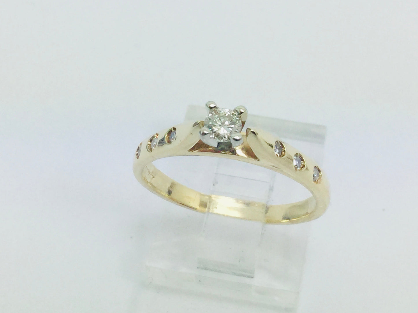 14k Yellow Gold Round Cut 0.21ct Diamond Solitaire with Accents Ring