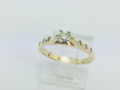 14k Yellow Gold Round Cut 0.21ct Diamond Solitaire with Accents Ring