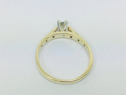 14k Yellow Gold Round Cut 0.21ct Diamond Solitaire with Accents Ring