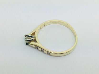 14k Yellow Gold Round Cut 0.21ct Diamond Solitaire with Accents Ring