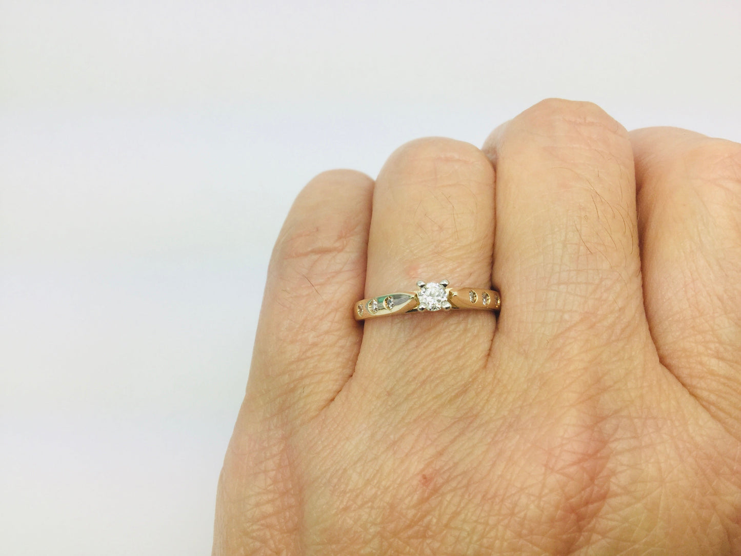 14k Yellow Gold Round Cut 0.21ct Diamond Solitaire with Accents Ring