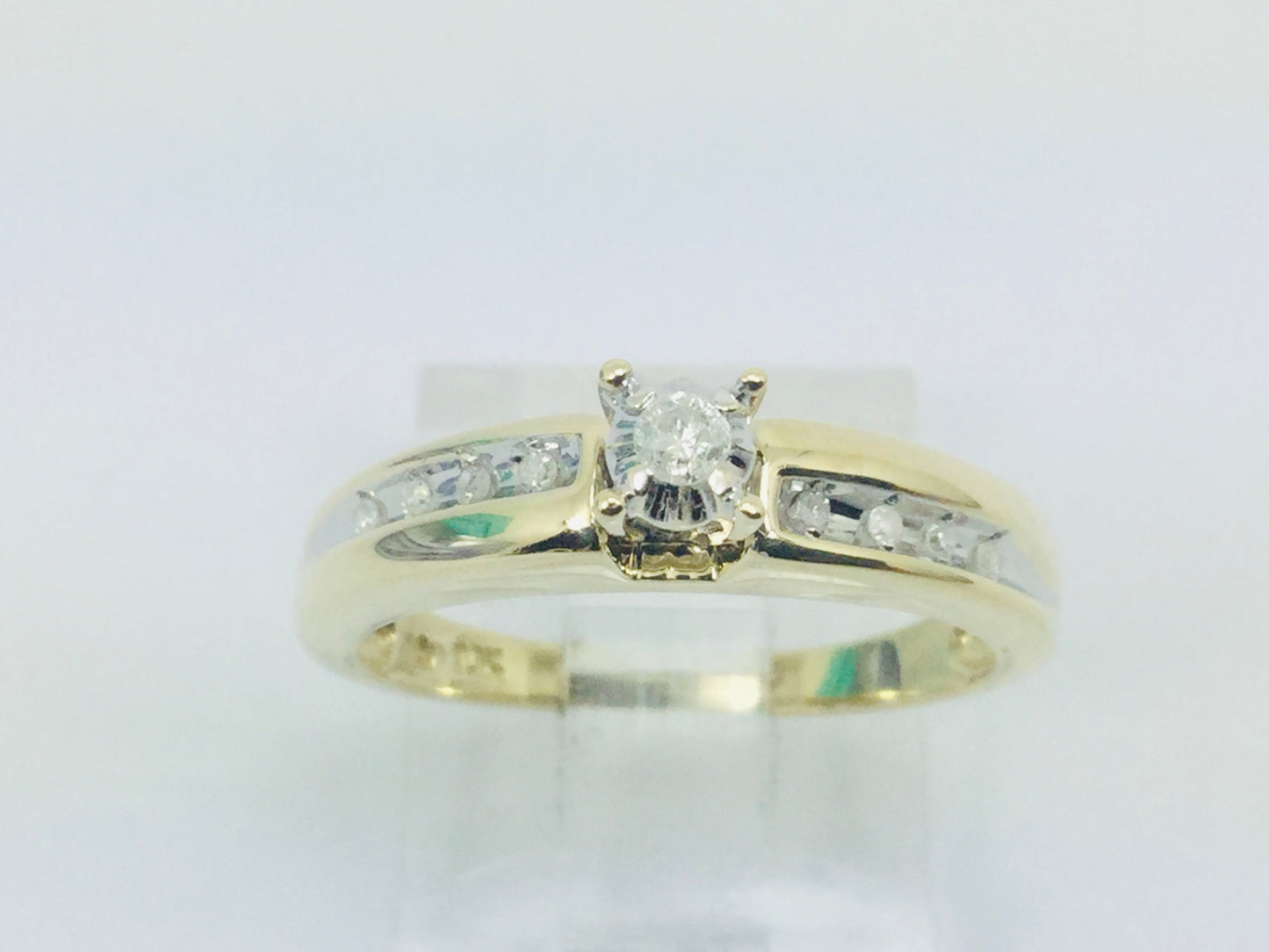 10k Yellow Gold Round Cut 7.5pt Diamond Solitaire with Accents Ring