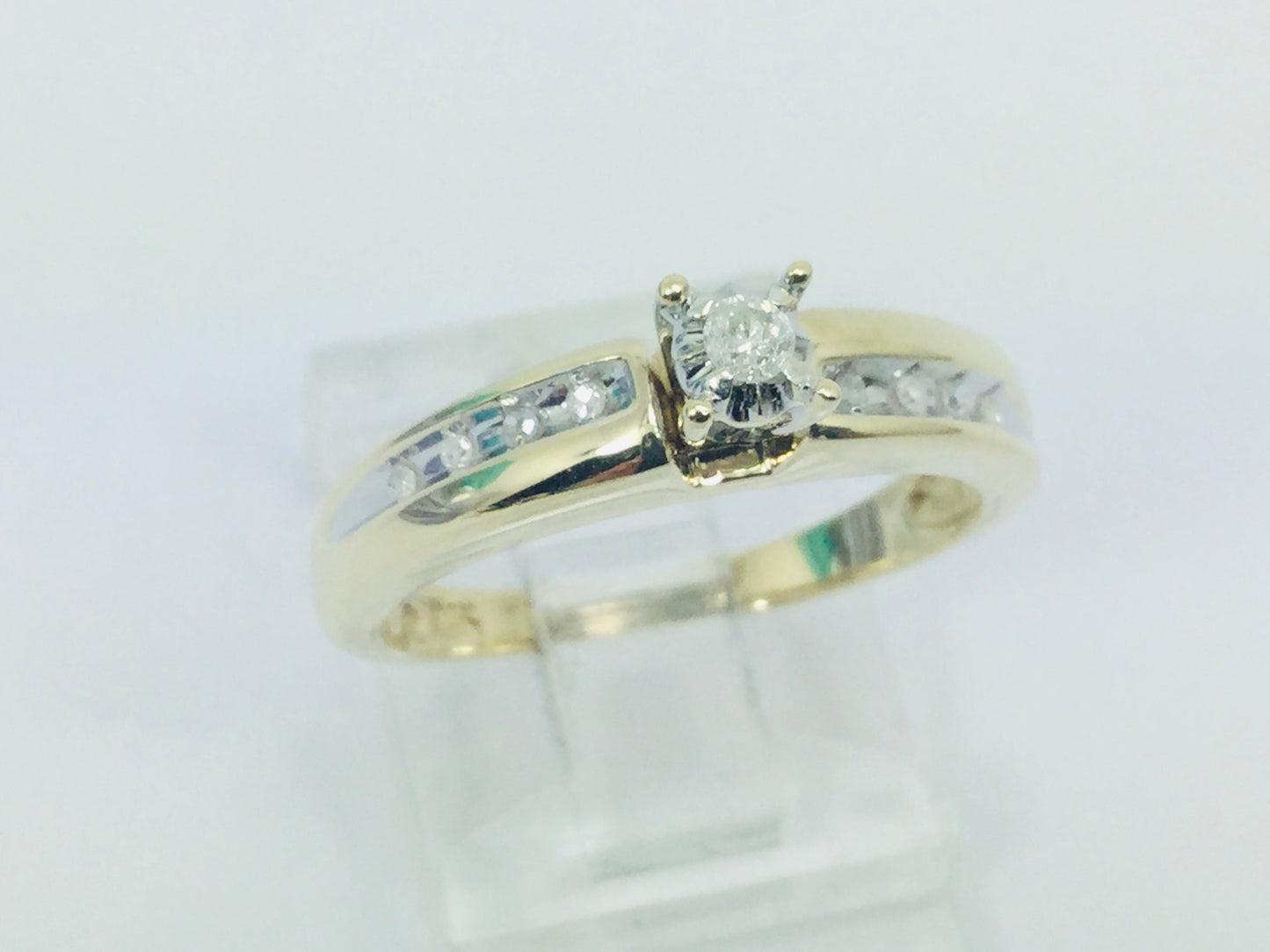 10k Yellow Gold Round Cut 7.5pt Diamond Solitaire with Accents Ring