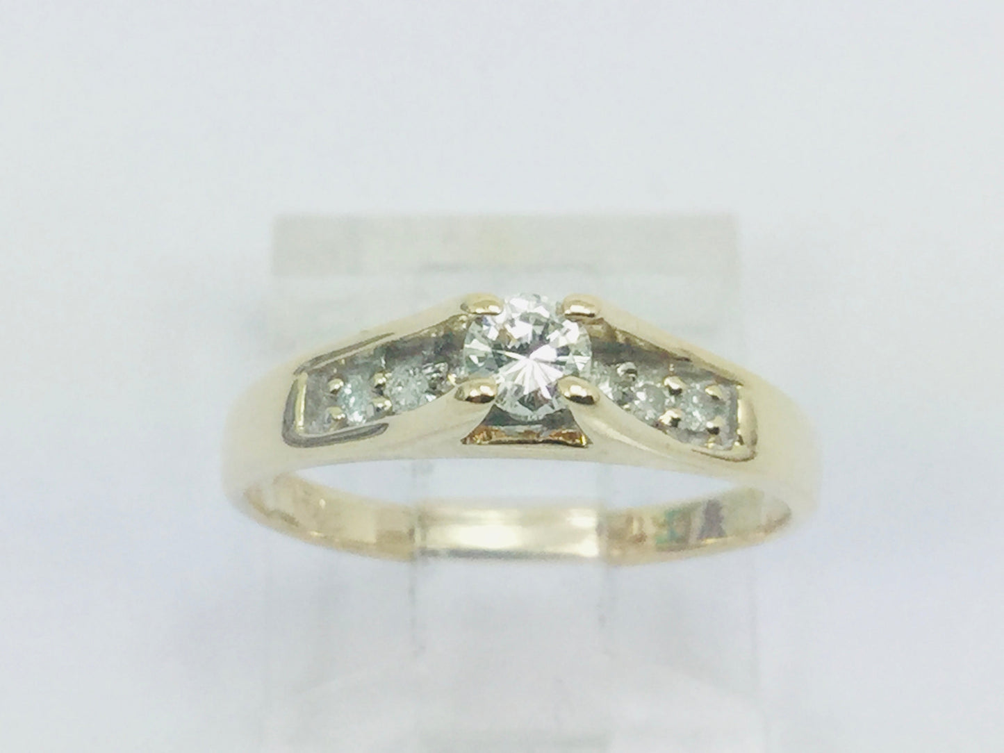 14k Yellow Gold Round Cut 0.25ct Diamond Solitaire with Accents Ring