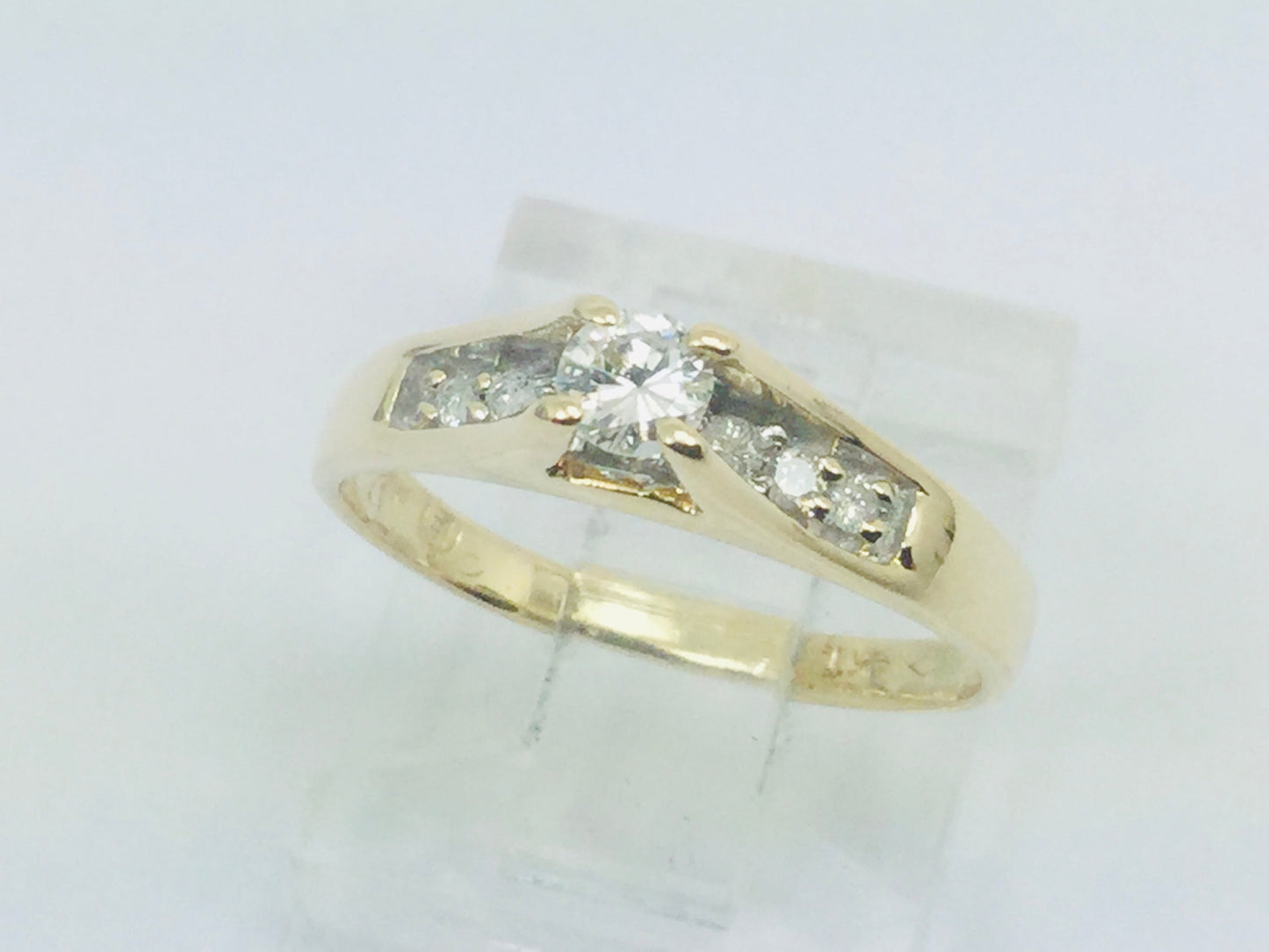 14k Yellow Gold Round Cut 0.25ct Diamond Solitaire with Accents Ring