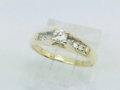 14k Yellow Gold Round Cut 0.25ct Diamond Solitaire with Accents Ring