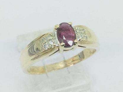10k Yellow Gold Round Cut 50pt Ruby July Birthstone & 8pt Diamond Accent Ring