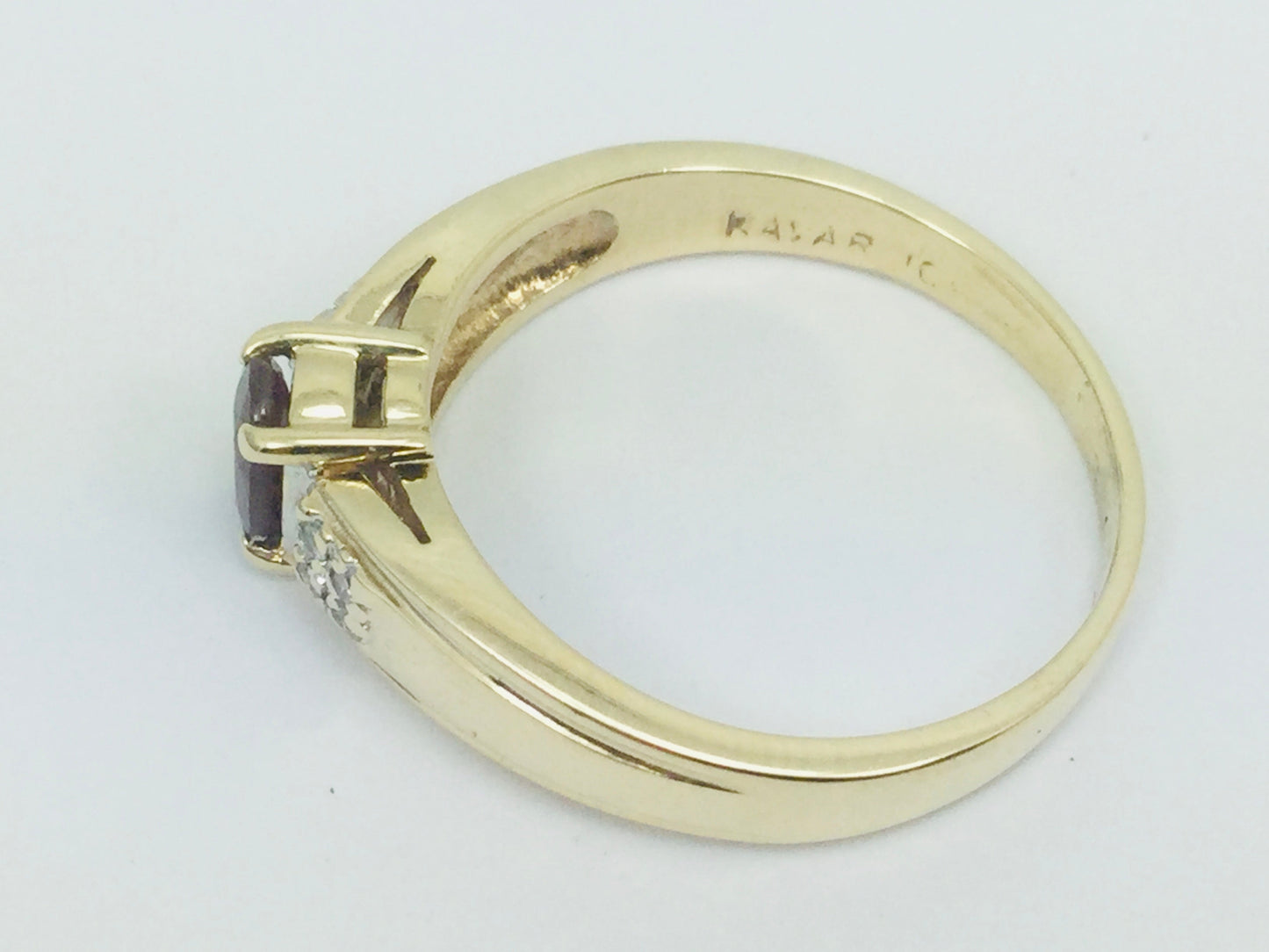 10k Yellow Gold Round Cut 50pt Ruby July Birthstone & 8pt Diamond Accent Ring