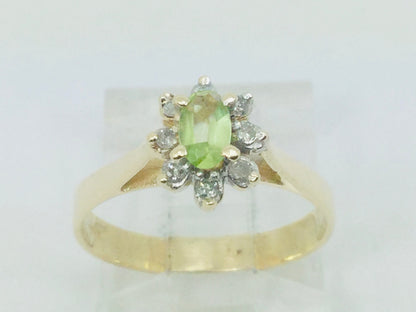 10k Yellow Gold Oval Cut 25pt Peridot August Birthstone & 8pt Diamond Halo Ring