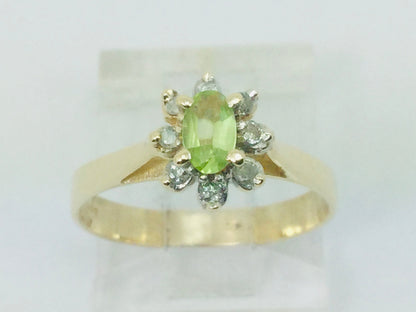 10k Yellow Gold Oval Cut 25pt Peridot August Birthstone & 8pt Diamond Halo Ring