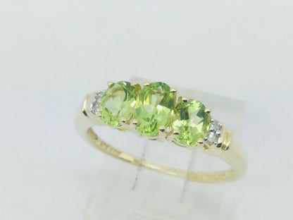 14k Yellow Gold Oval Cut 1.3ct Peridot August Birthstone & 2pt Diamond Halo Ring
