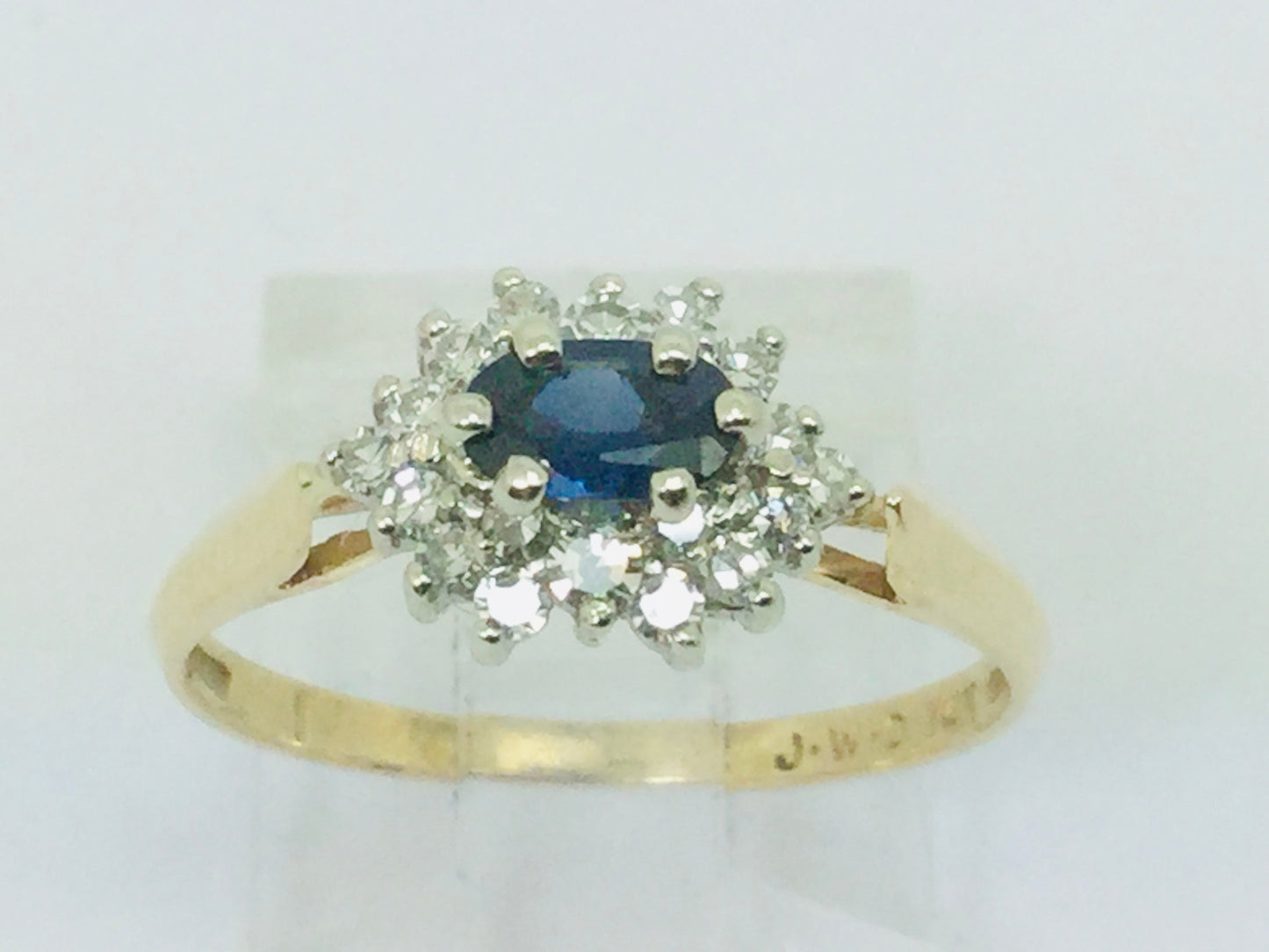 14k Yellow and White Gold Oval Cut 0.35ct Sapphire September Birthstone & 0.30ct Diamond Cluster Ring