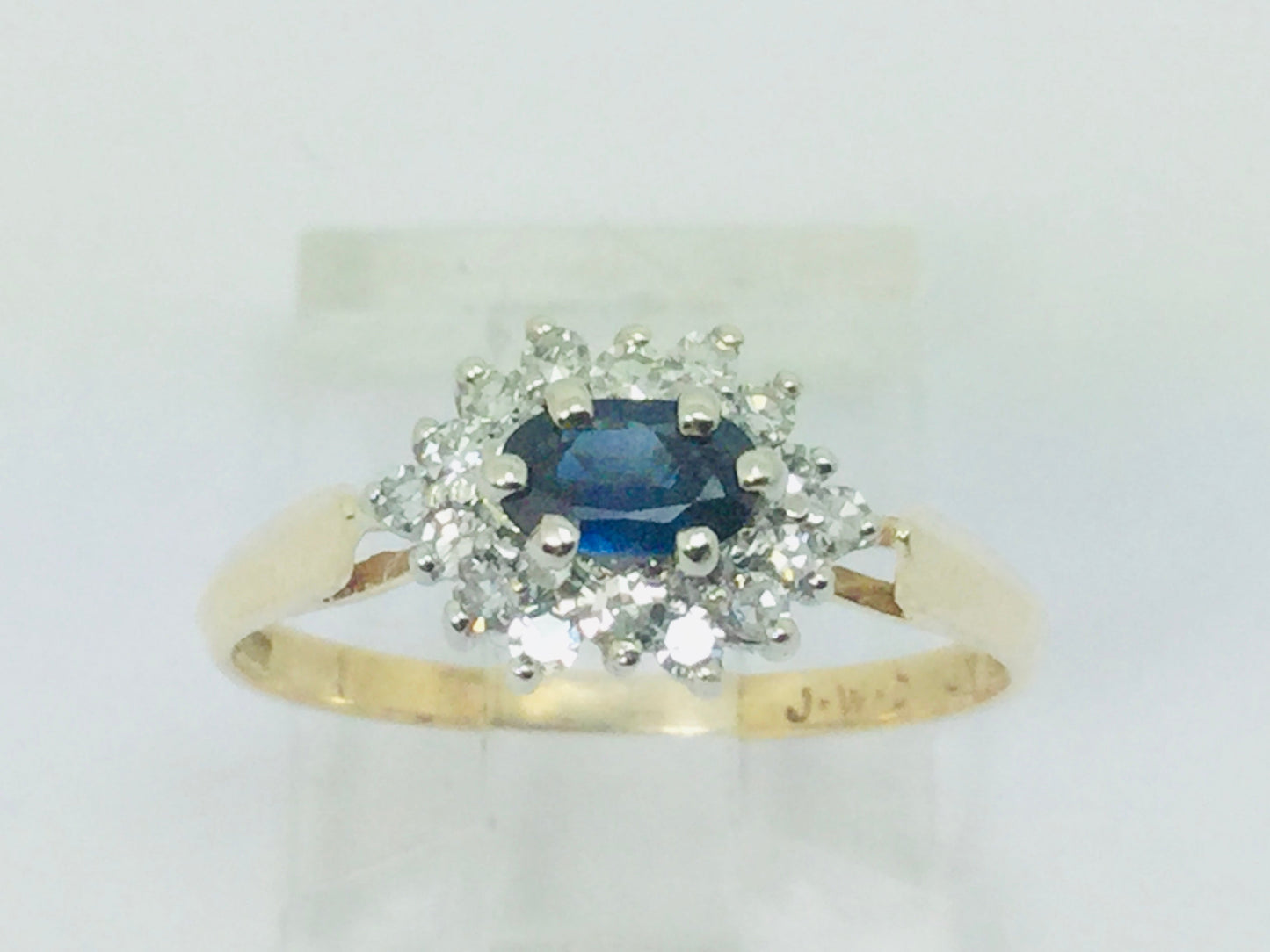 14k Yellow and White Gold Oval Cut 0.35ct Sapphire September Birthstone & 0.30ct Diamond Cluster Ring