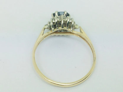 14k Yellow and White Gold Oval Cut 0.35ct Sapphire September Birthstone & 0.30ct Diamond Cluster Ring